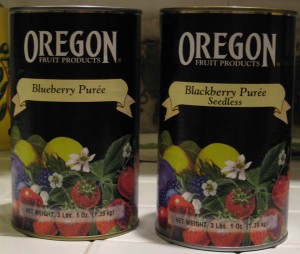 Cans of Oregon fruit puree